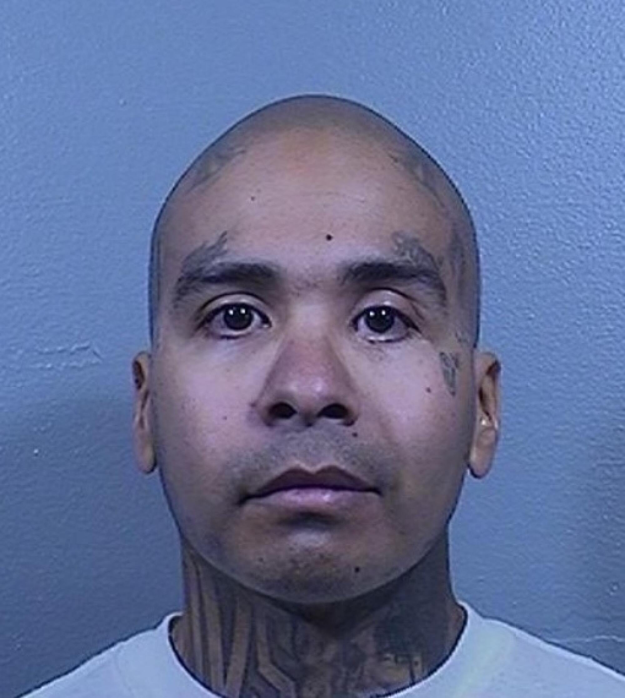 Michael Caldera is charged with murdering Sidney Kang at Kern Valley State Prison.