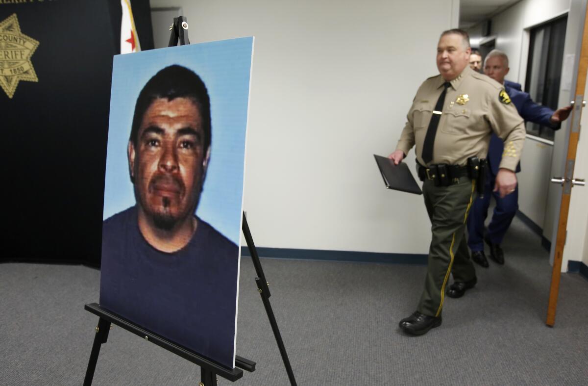 A photo of Paul Perez displayed at a news conference