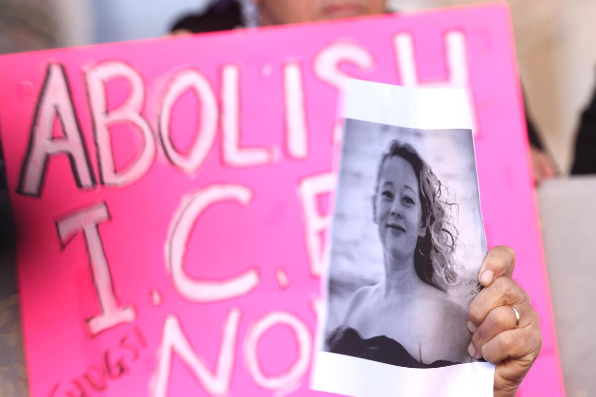 Dozens attend a protest over the shooting death of Renee Nicole Good who was shot dead Wednesday by an ICE agent 