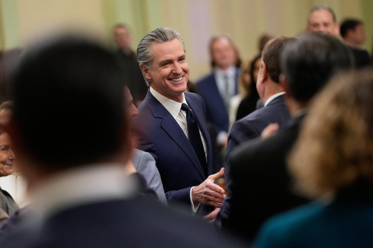 Gov. Gavin Newsom arrives for his State of the State address Thursday in Sacramento.