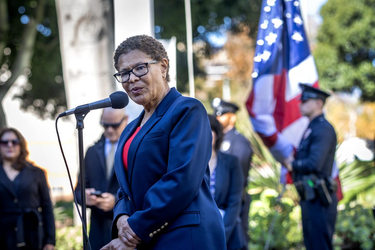 Mayor Karen Bass at a ceremony where flags are lowered to mark the anniversary of the Palisades and Eaton fires.