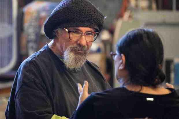 Owner James Rappaport, left, helps a customer at Planet Books in Signal Hill on Thursday, January 8, 2026. (Photo by Drew A. Kelley, Press-Telegram/SCNG)