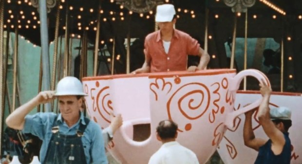 Workers install the Mad Tea Party teacups in Fantasyland at Disneyland before the park opened in 1955. (Courtesy of Disney)