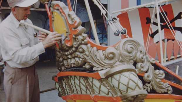 A craftsman paints a pirate ship at Disneyland before the park opened in 1955. (Courtesy of Disney)