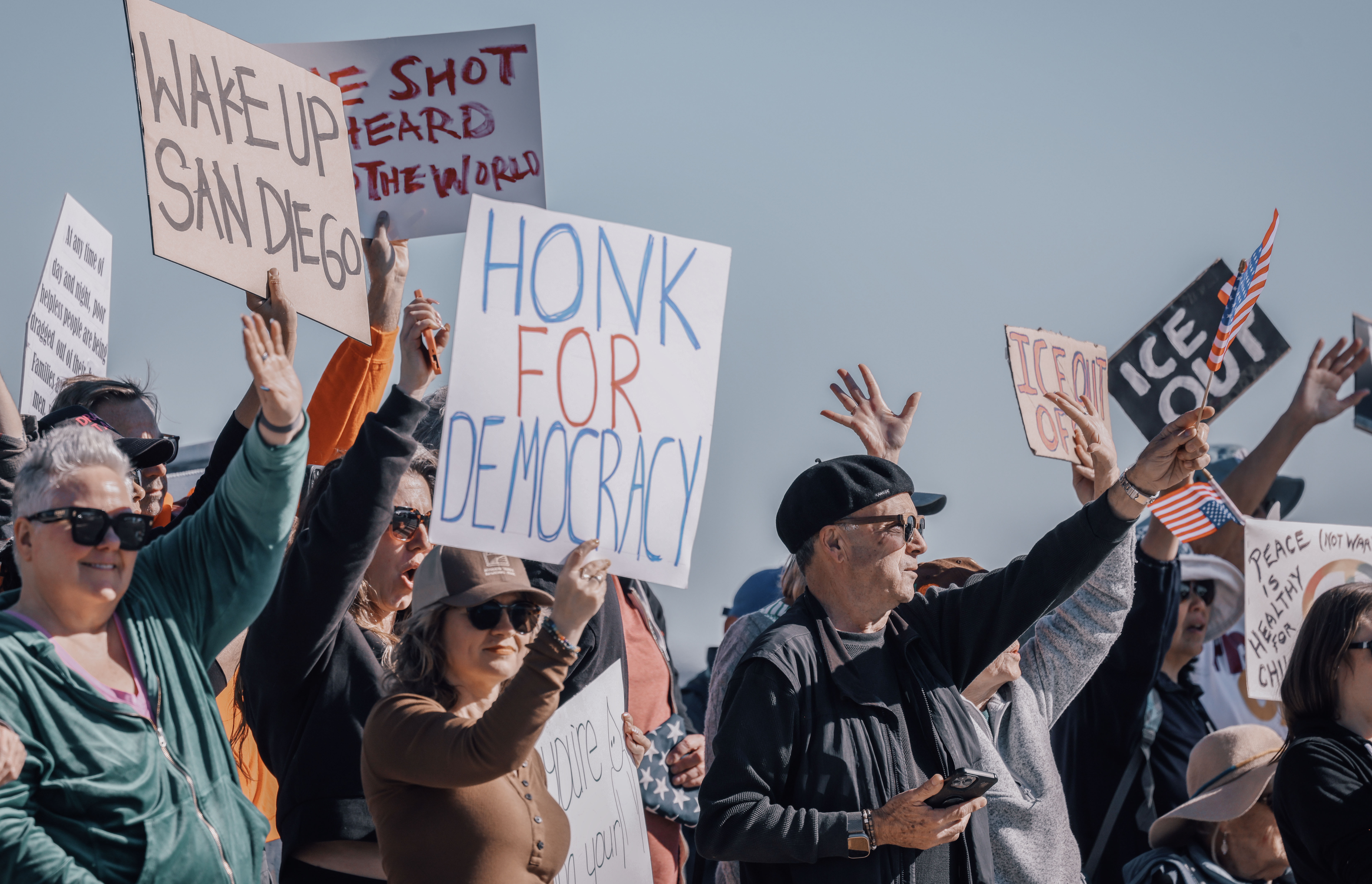Protesters chant during a demonstration against ICE and the recent...