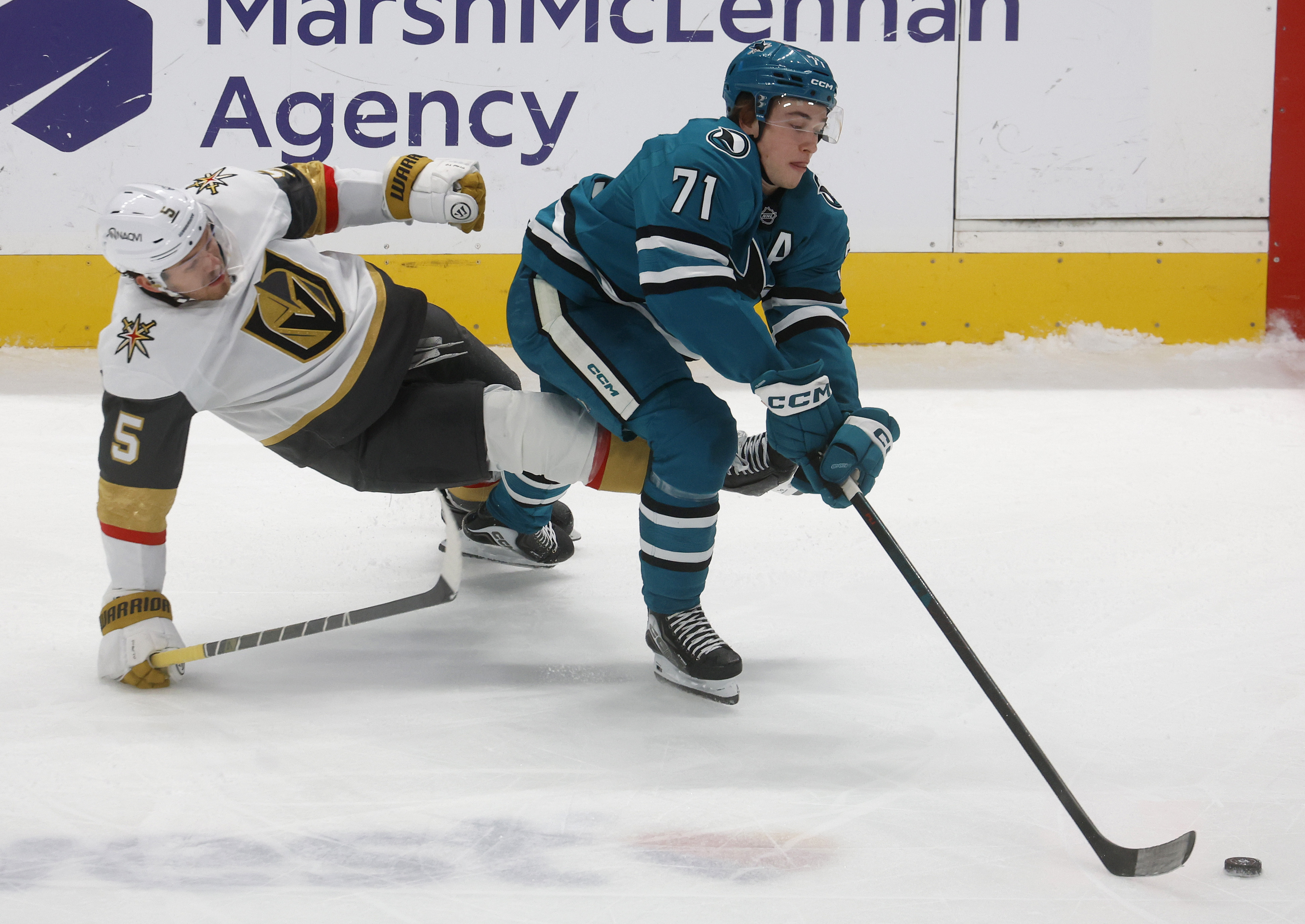 San Jose Sharks’ Macklin Celebrini (71) controls the puck against...