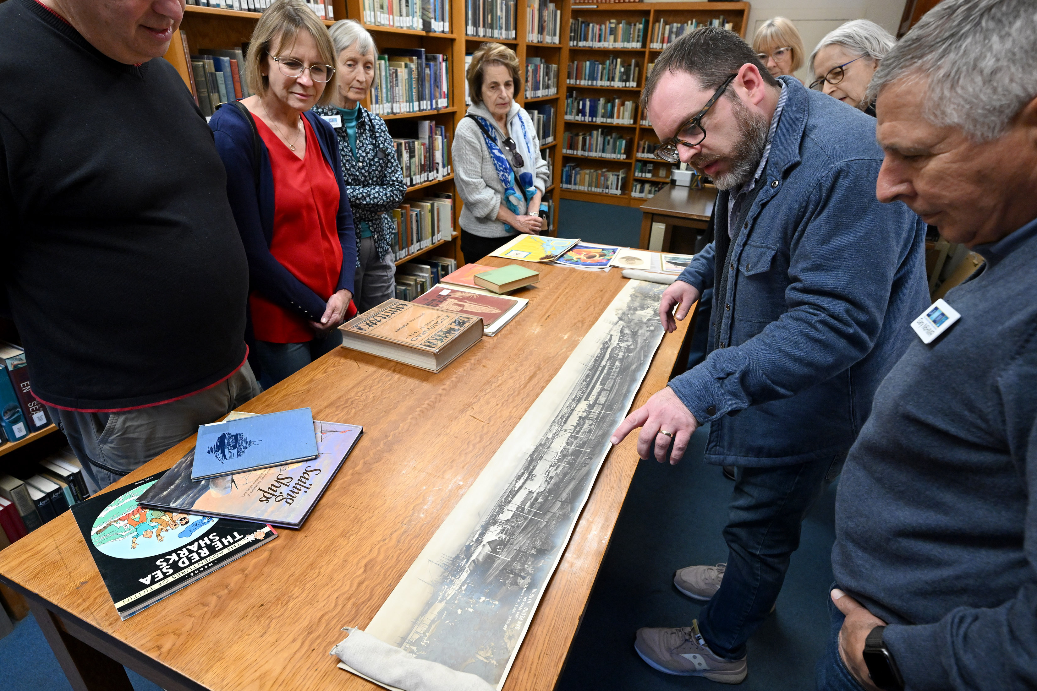 Derek Spinei, an archivist with the Los Angeles Maritime Museum,...