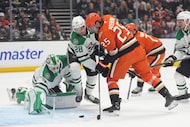 Anaheim Ducks center Ryan Poehling (25) scores a goal as Dallas Stars goaltender Casey...