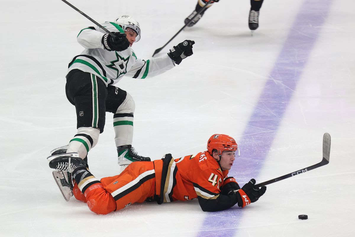 Anaheim Ducks right winger Beckett Sennecke (45) drops to the ice during an NHL game against the Dallas Stars on January 13, 2026 in Anaheim, CA.