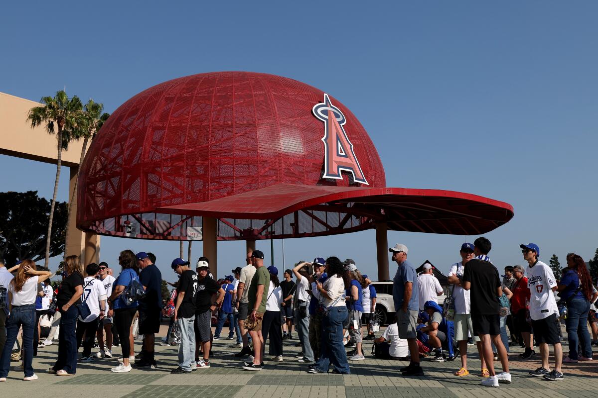  Fans wait to enter Angel Stadium of Anaheim on Aug. 12, 2025.
