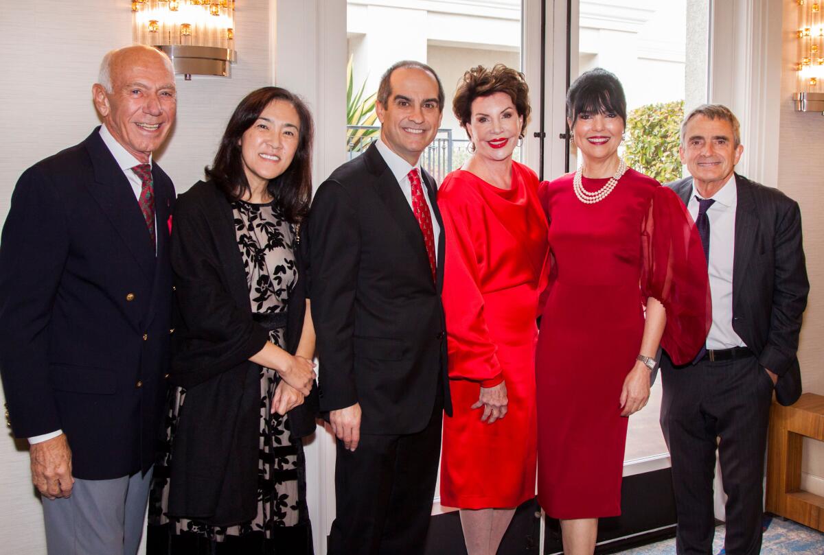Celebrating Christmas at the Ritz are Jim Burra, Janie and Matt Parlow, Adrienne Brandes, Jacqie Penner and Stephen Gall.
