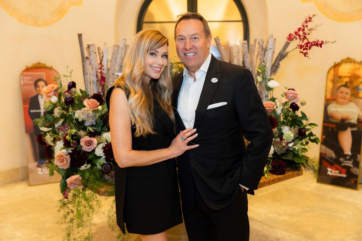 Bree Cox Kennedy and Cary Hyden attend the recent CureDuchenne fundraiser.