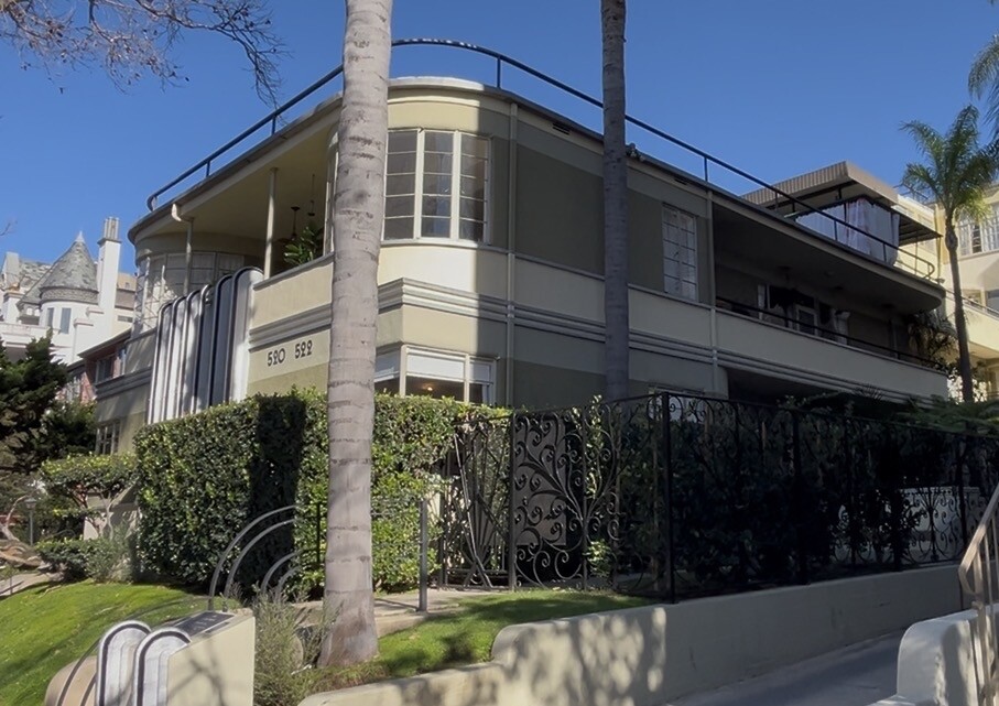 The Mauretania, a 1930s apartment building with distinctive curved windows looking out on the street, is one of the properties Dave Goldstein owns through Art Deco Apartments. 