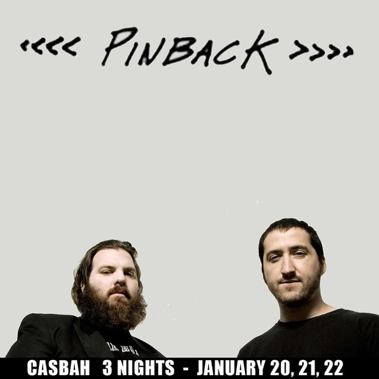 Heads and shoulders of two musicians below band logo for Pinback