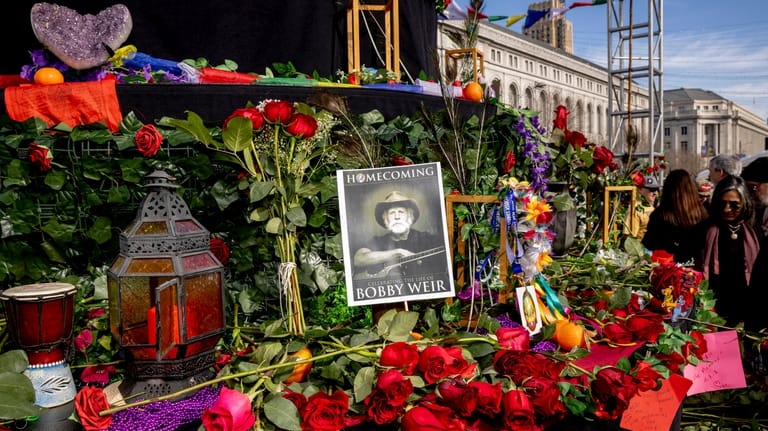 Attendees gather during a public memorial for Grateful Dead co-founder...