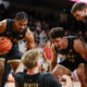 Purdue guard Jack Benter, center bottom, is congratulated by guards C.J. Cox, left, Omer Mayer (17) and Braden Smith, right, after blocking a shot by Southern California guard Jordan Marsh during the second half of an NCAA college basketball game Saturday, Jan. 17, 2026, in Los Angeles. (AP Photo/Caroline Brehman)