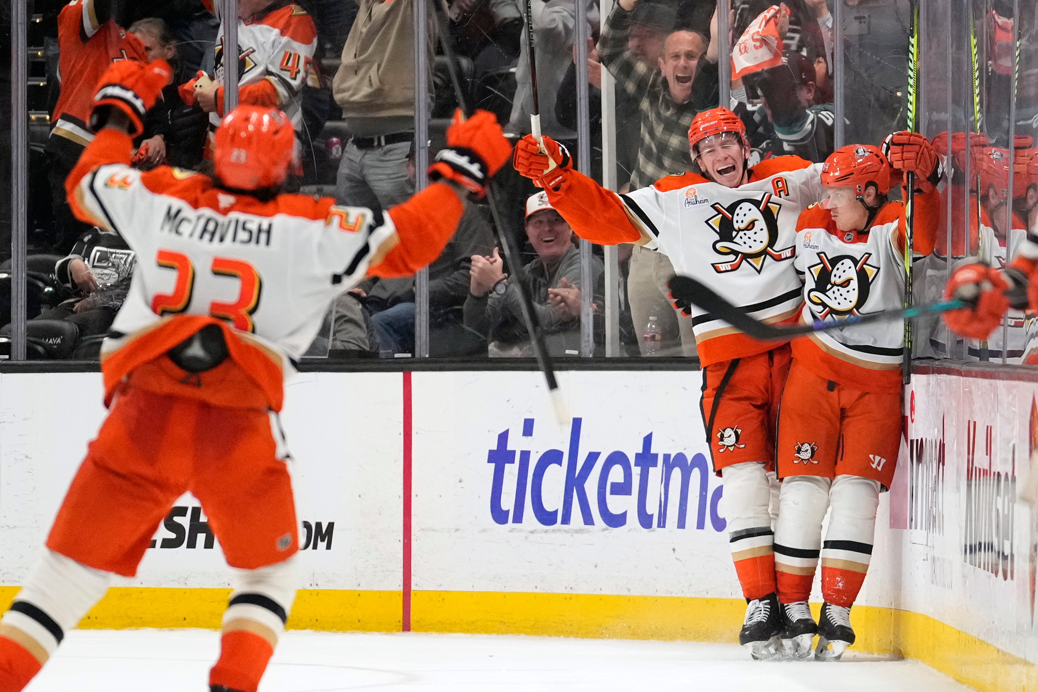 Ducks center Mikael Granlund, right, celebrates his game-winning goal along...