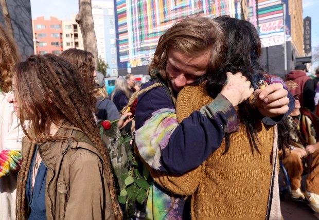 Grateful Dead fans console each other at the Bob Weir memorial at Civic Center Plaza in San Francisco, Calif., on Saturday, Jan. 17, 2026. Thousands of people gathered to say goodbye to the band's co-founder and guitarist, who passed away on Jan. 10. (Jane Tyska/Bay Area News Group)