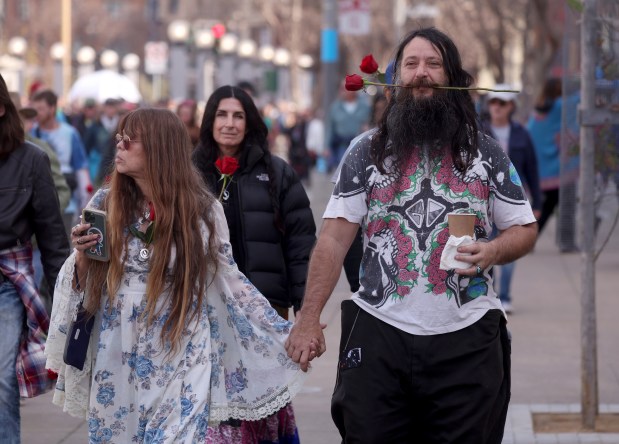Grateful Dead fans Anthony Terranova, of San Diego, and Tessie Whitemore, of Los Angeles, attend the Bob Weir memorial at Civic Center Plaza in San Francisco, Calif., on Saturday, Jan. 17, 2026. Thousands of people gathered to say goodbye to the band's co-founder and guitarist, who passed away on Jan. 10. (Jane Tyska/Bay Area News Group)
