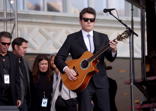 Dead & Company lead guitarist John Mayer plays "Ripple" during the Bob Weir memorial at Civic Center Plaza in San Francisco, Calif., on Saturday, Jan. 17, 2026. Thousands of people gathered to say goodbye to the Grateful Dead's co-founder and guitarist, who passed away on Jan. 10. (Jane Tyska/Bay Area News Group)