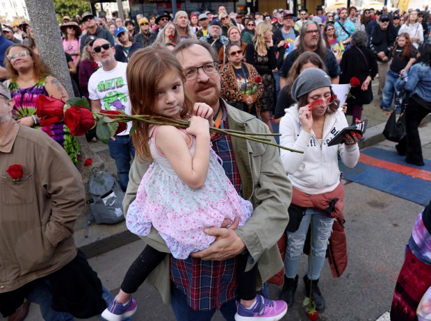 Grateful Dead fans John Peknik, and his daughter Scarlet, 4, of Sacramento, attend the Bob Weir memorial at Civic Center Plaza in San Francisco, Calif., on Saturday, Jan. 17, 2026. Thousands of people gathered to say goodbye to the band's co-founder and guitarist, who passed away on Jan. 10. (Jane Tyska/Bay Area News Group)