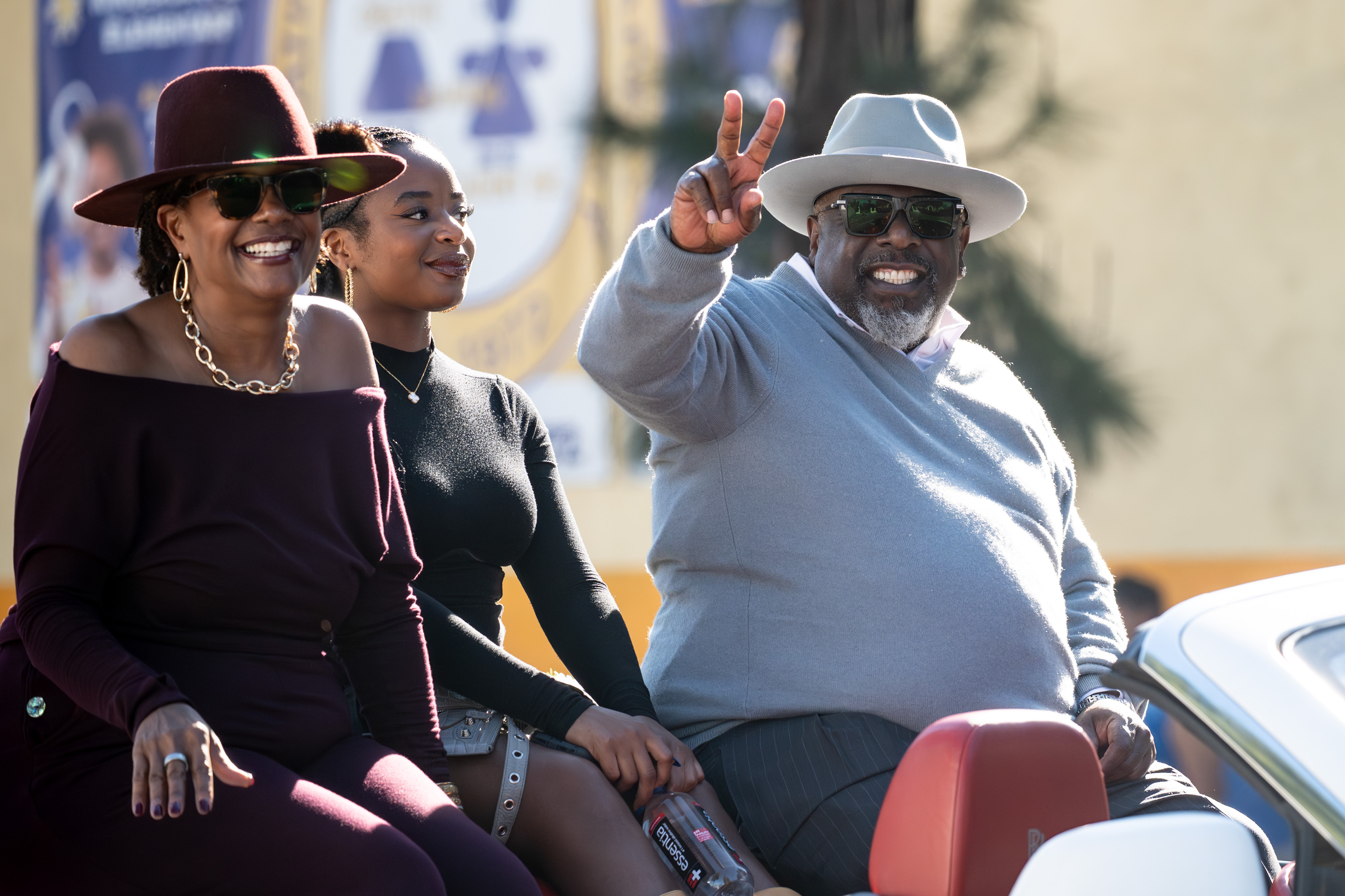 Cedrick the Entertainer waves to crowds in the Kingdom Day...