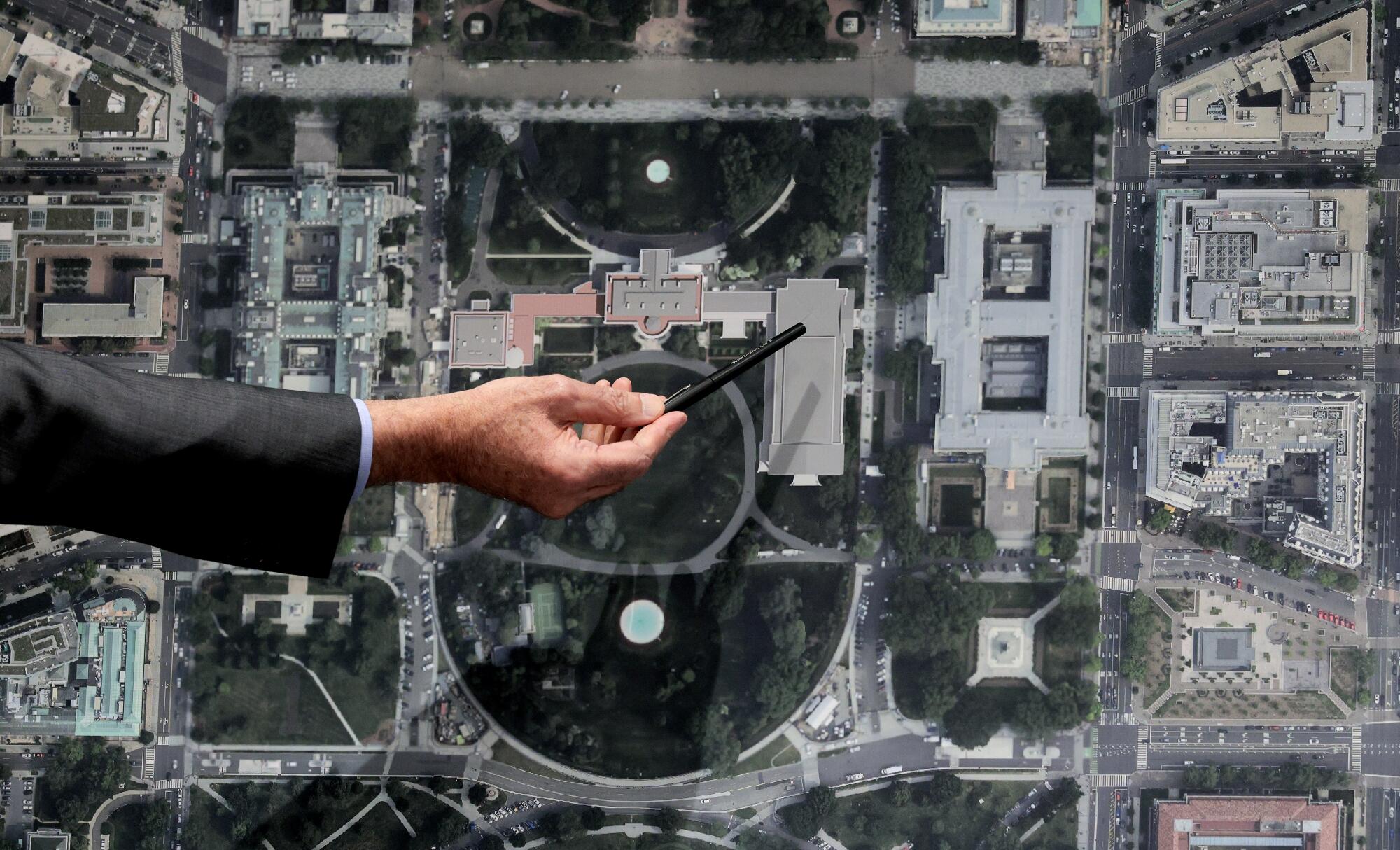 Architect Shalom Baranes shows a site plan for a new $400-million White House ballroom.