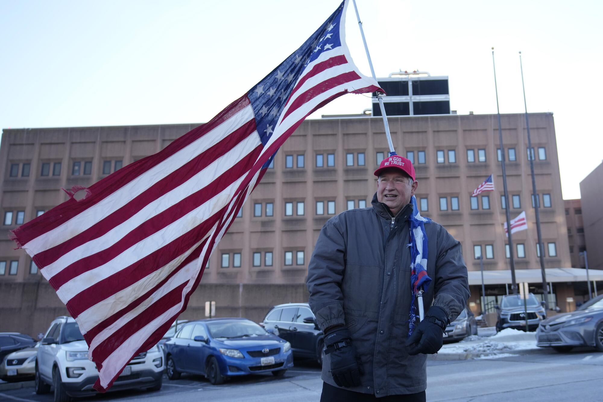 Ben Pollock awaits the possible release of his children outside the DC Central Detention Facility on Jan. 20.