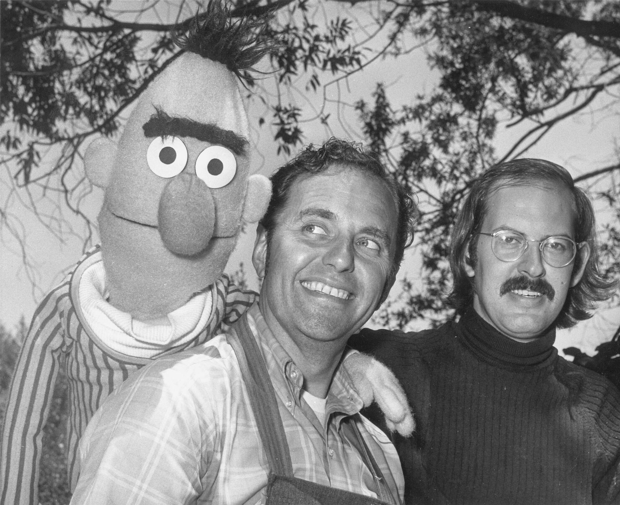Burt, with master puppeteers Lewis Mahlmann and Frank Oz at Children's Fairyland.