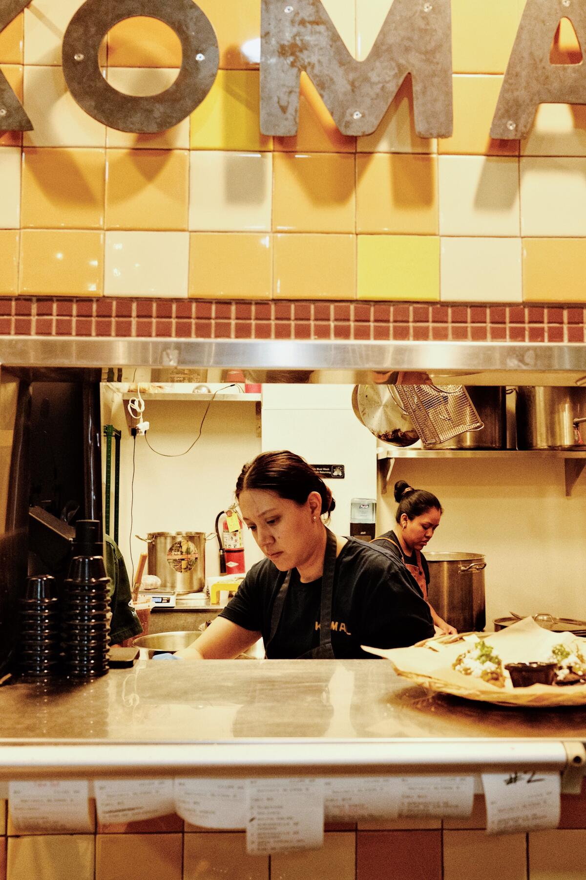 Komal co-owner Fátima Júarez works the line in the kitchen of her combination restaurant and molino in 2024.