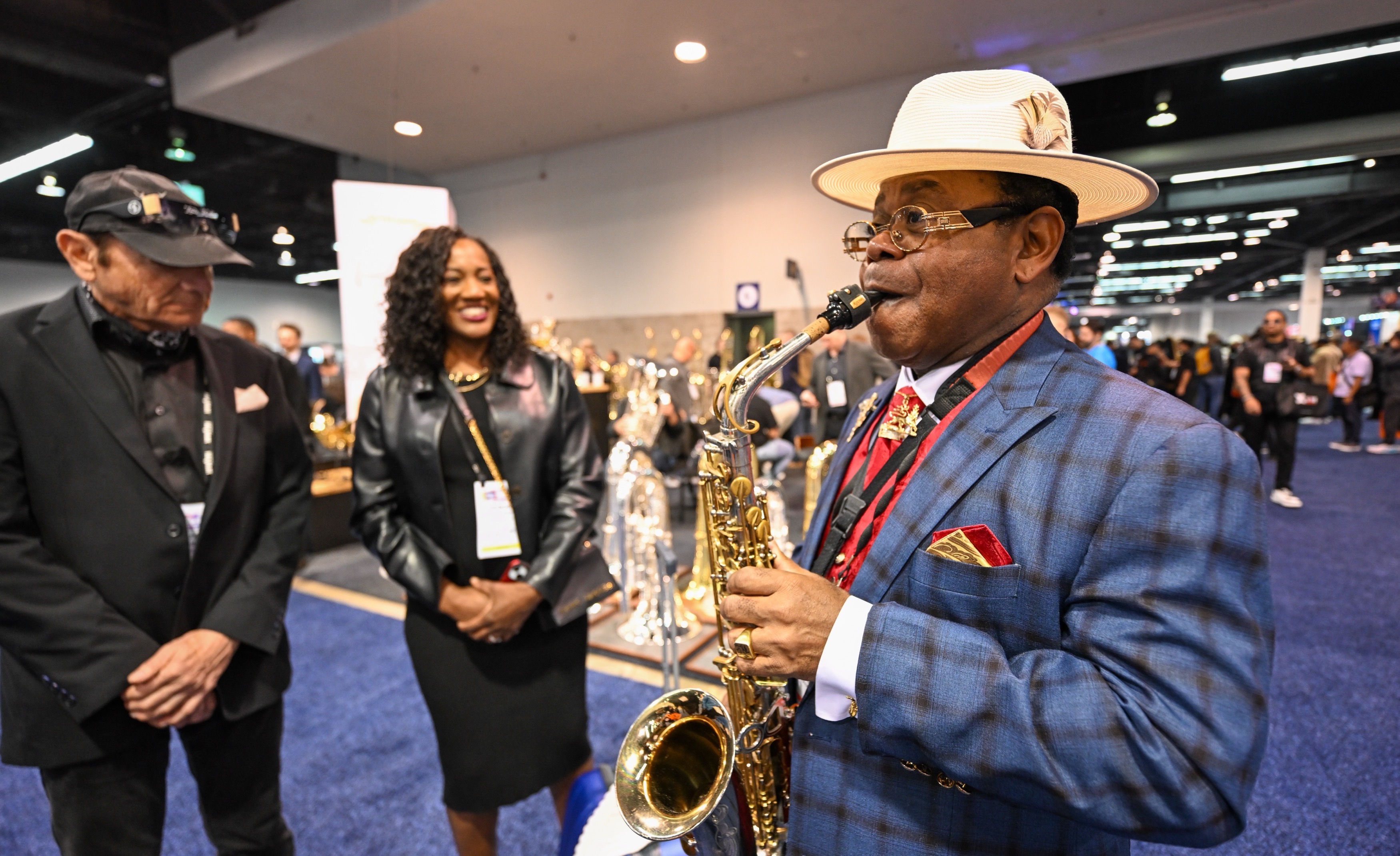 Rev. Alvin McKinney plays for a small group during the...