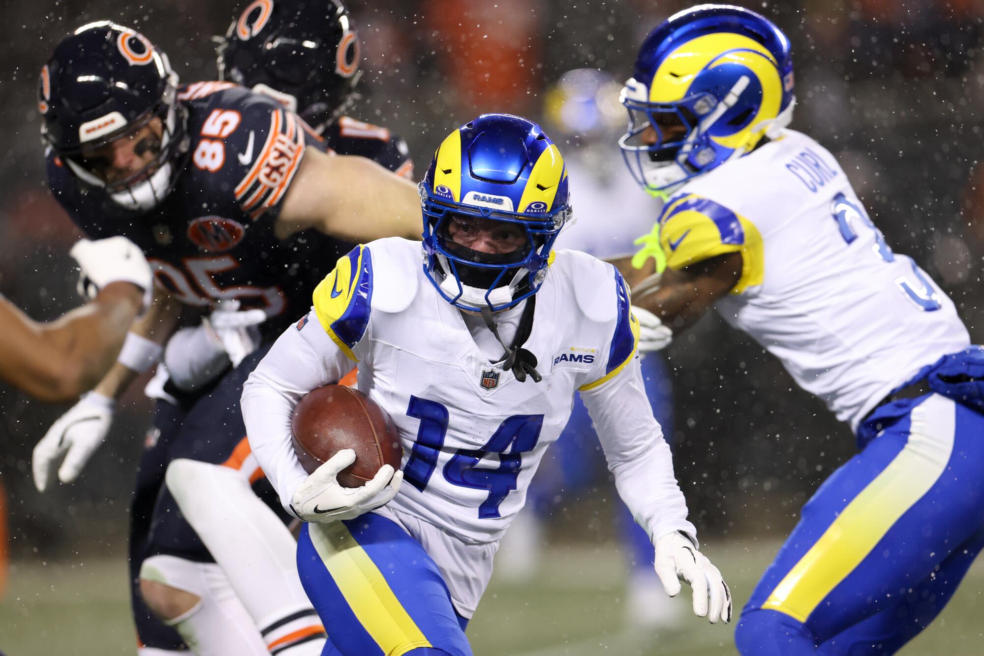 Rams cornerback Cobie Durant runs with the ball after intercepting a pass against the Chicago Bears.