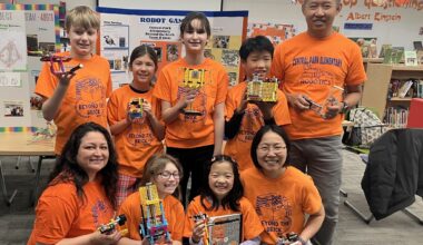 The "Beyond the Bricks" Central Park Elementary robotics team: (front row, from left) coach Lina Cano Ackerman, Camille Krause, Audrey Houser, coach SzeSze Ng; (back row, from left) Mason Curry, Evelyn Laitar, Cassey Ackerman, Bo Rui Koh, coach Shan Pin Koh. Not pictured is student Mark Xu.