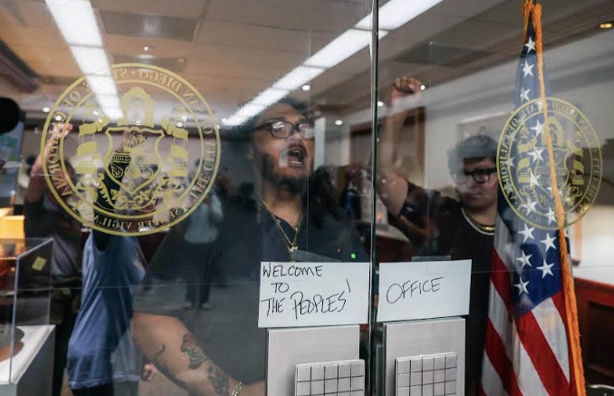 Activists barricade themselves inside Gloria's office, demand action on ICE