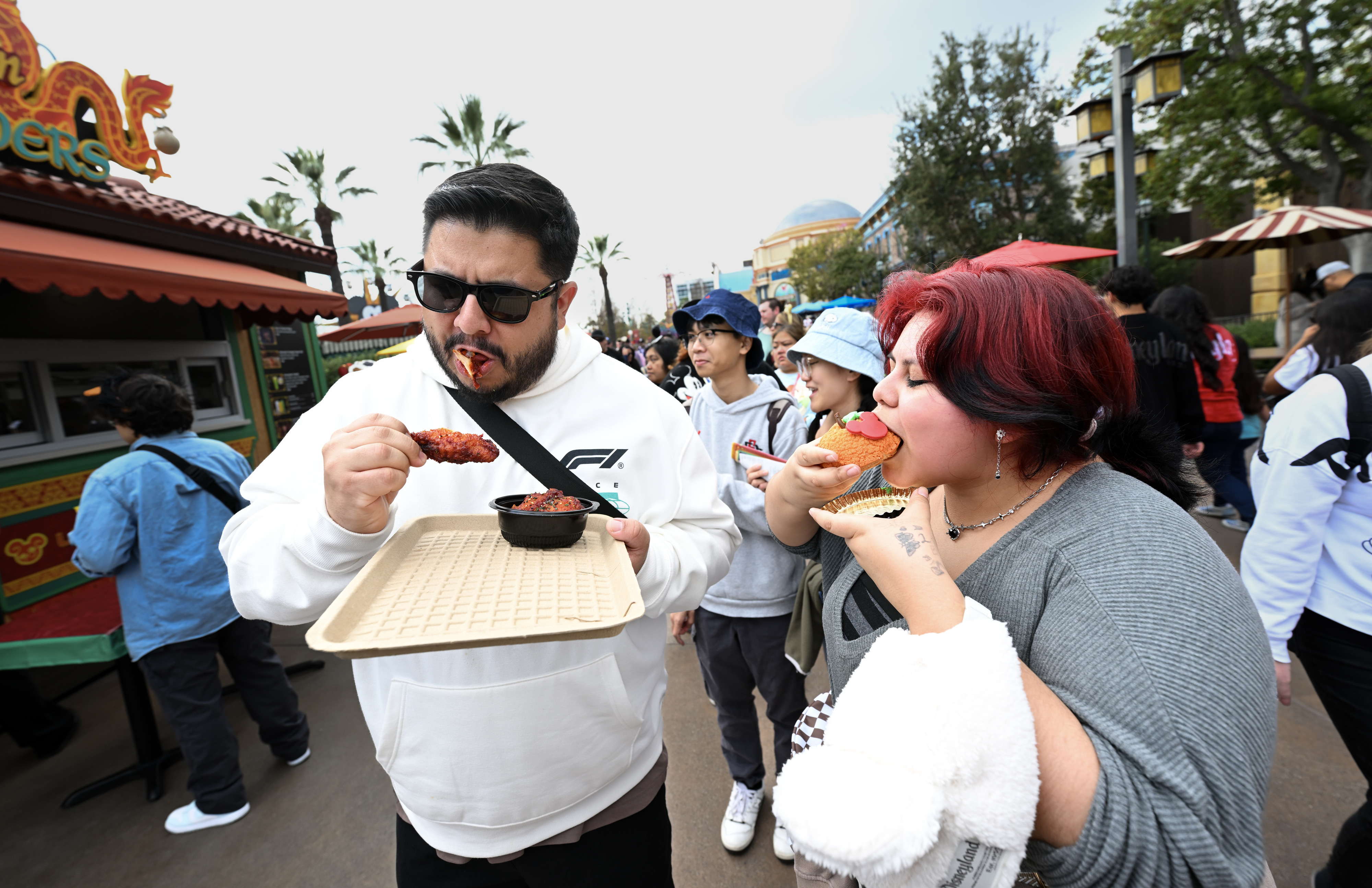 Johnny Tovalan and Anahi Henriquez check out the Spicy Chicken...