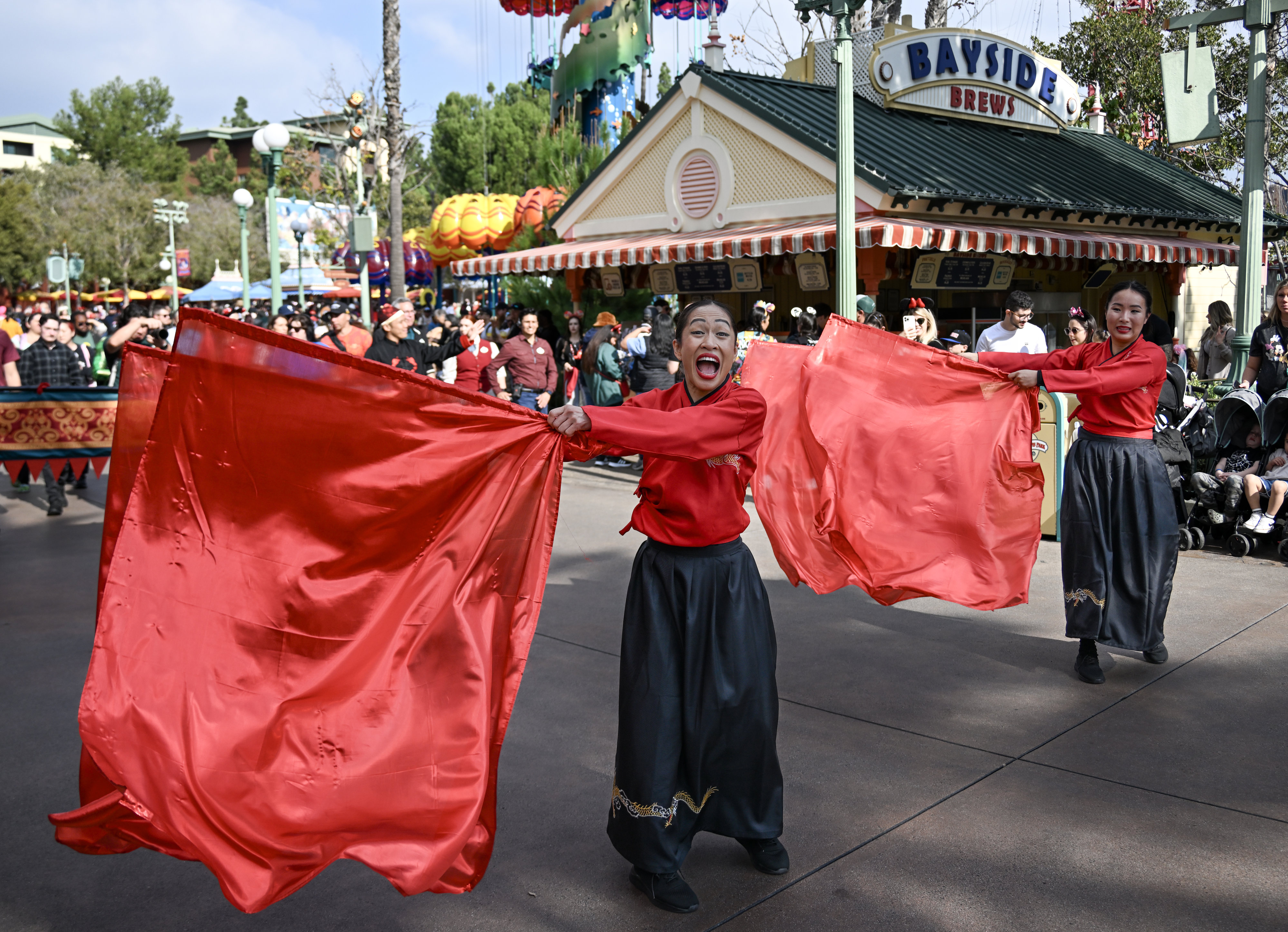 Mulan’s Lunar New Year Procession head through Paradise Pier during...