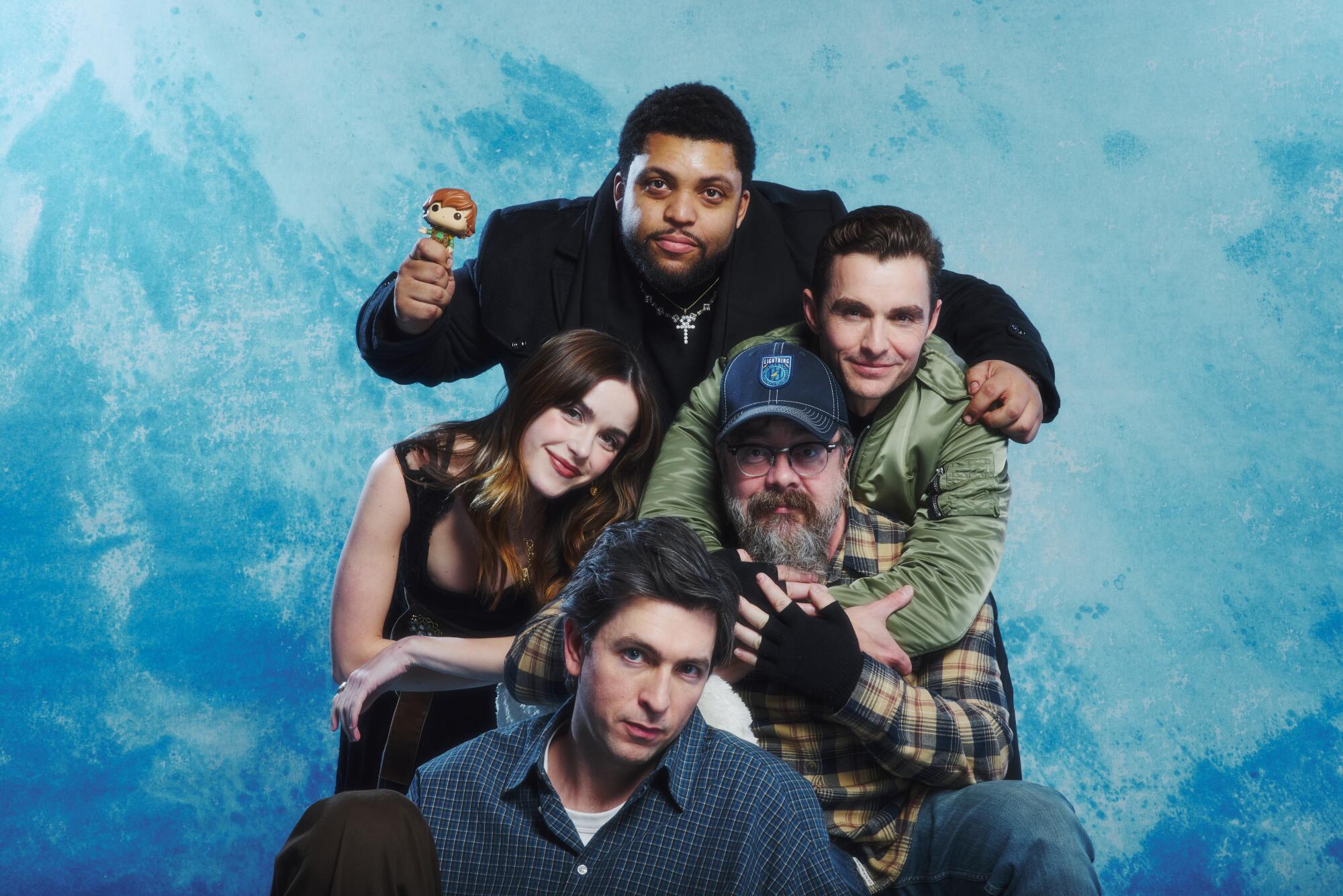 Kiernan Shipka, O'Shea Jackson Jr., Dave Franco, Macon Blair, seated, and Nicholas Braun, on the floor, of "The Shitheads."