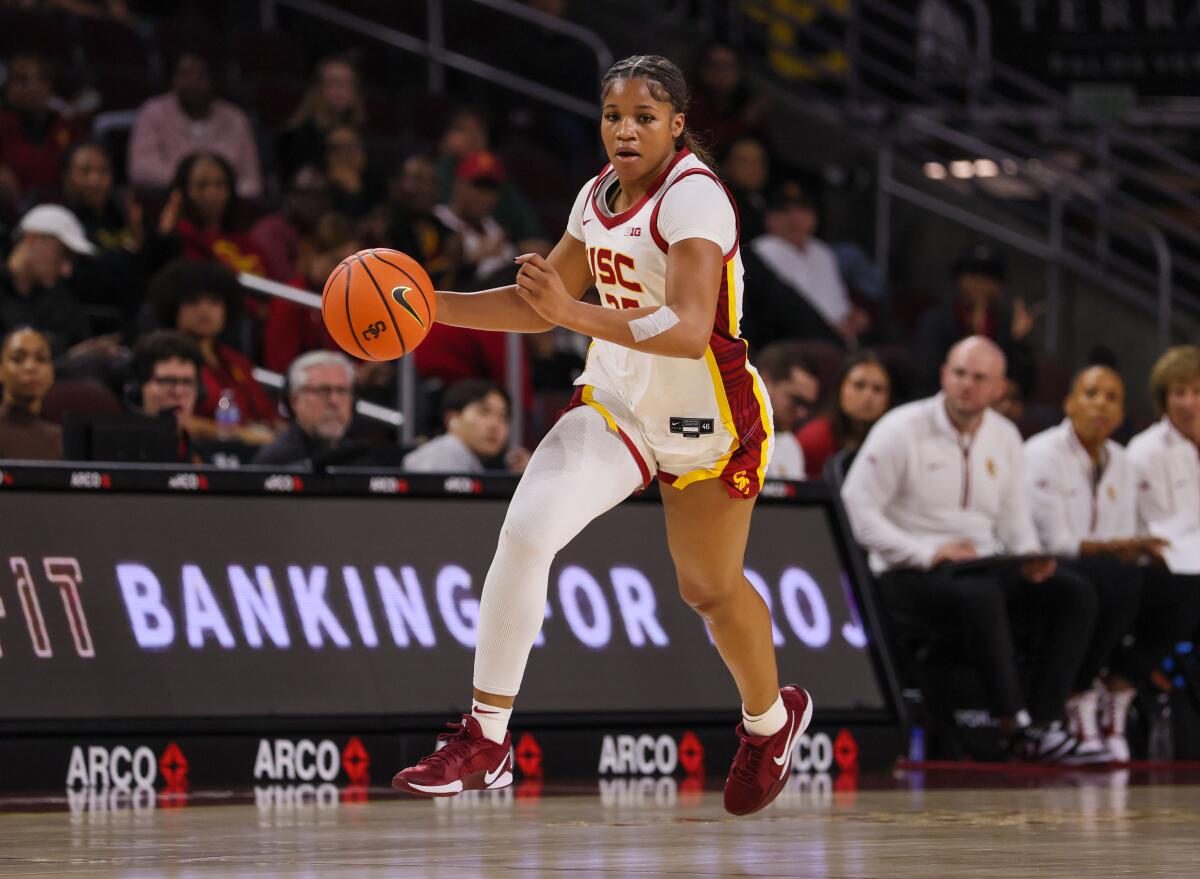 USC guard Kara Dunn dribbles the ball up court during a game in December.