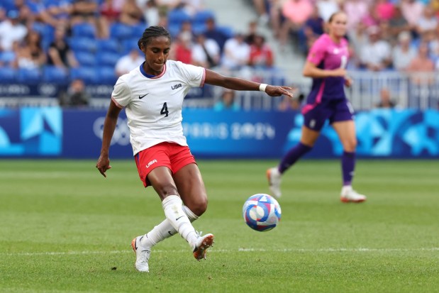 Naomi Girma #4 of Team United States passes the ball during the Women's semifinal match between United States of America and Germany during the Olympic Games Paris 2024 at Stade de Lyon on Aug. 06, 2024 in Lyon, France. (Photo by Claudio Villa/Getty Images)