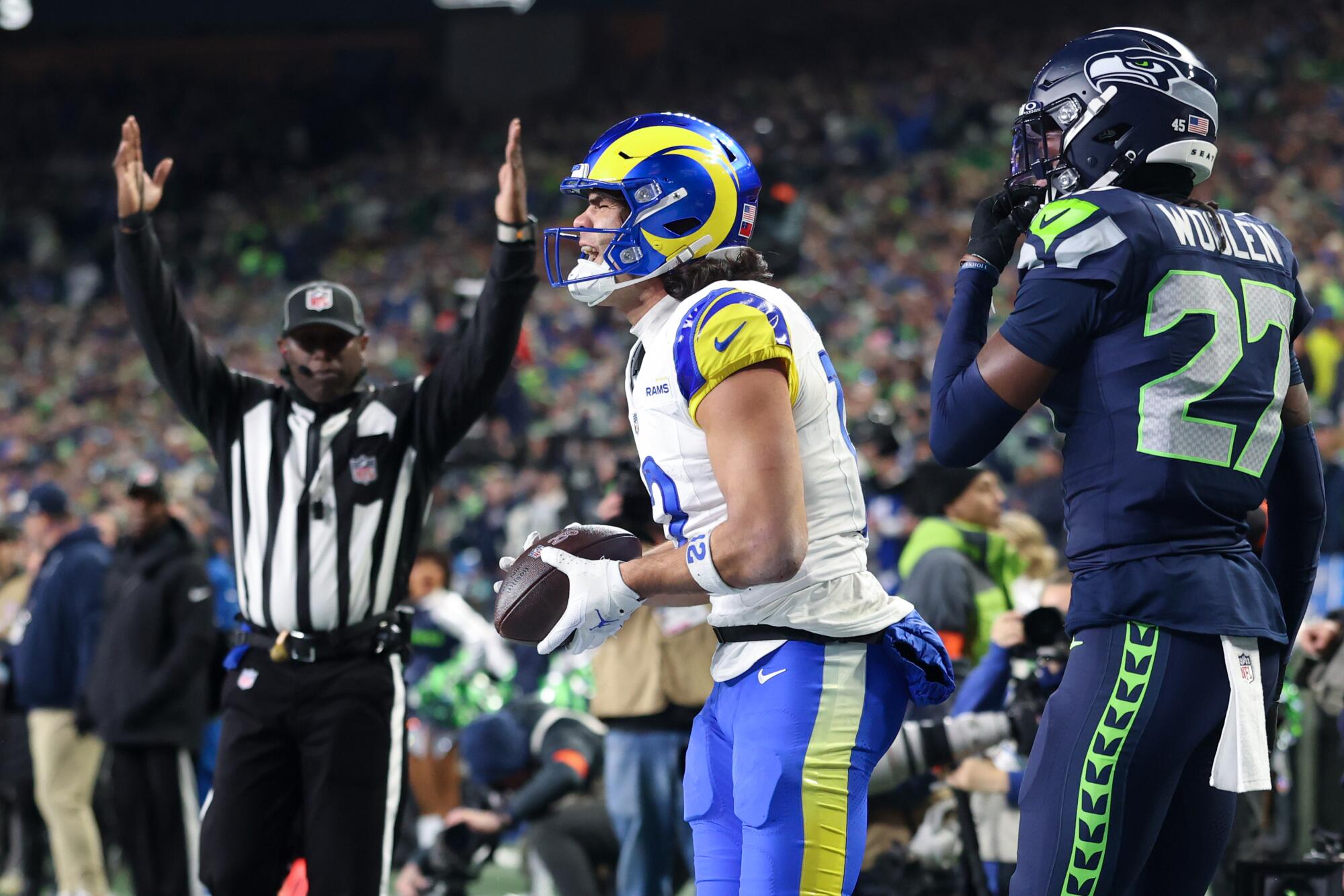 Rams wide receiver Puka Nacua celebrates after catching a 34-yard touchdown pass.