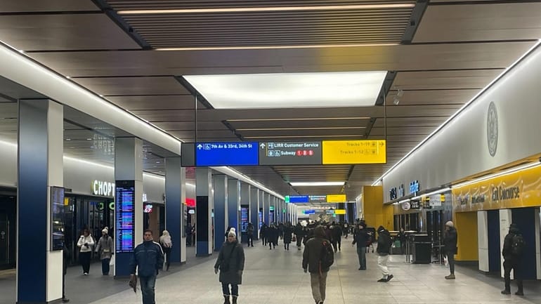 Travelers in the LIRR terminal of Penn Station on Sunday.