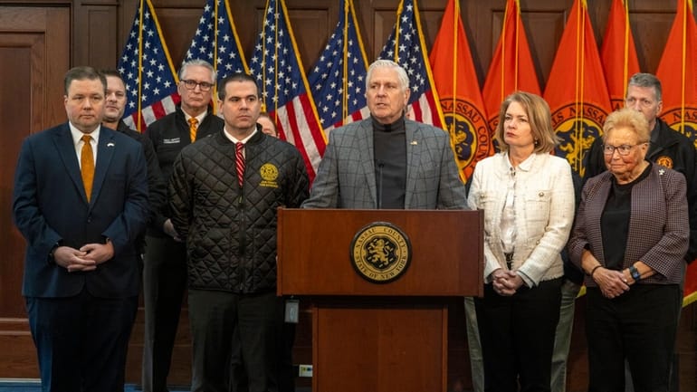 Nassau County Executive Bruce Blakeman stands with Town of Hempstead...