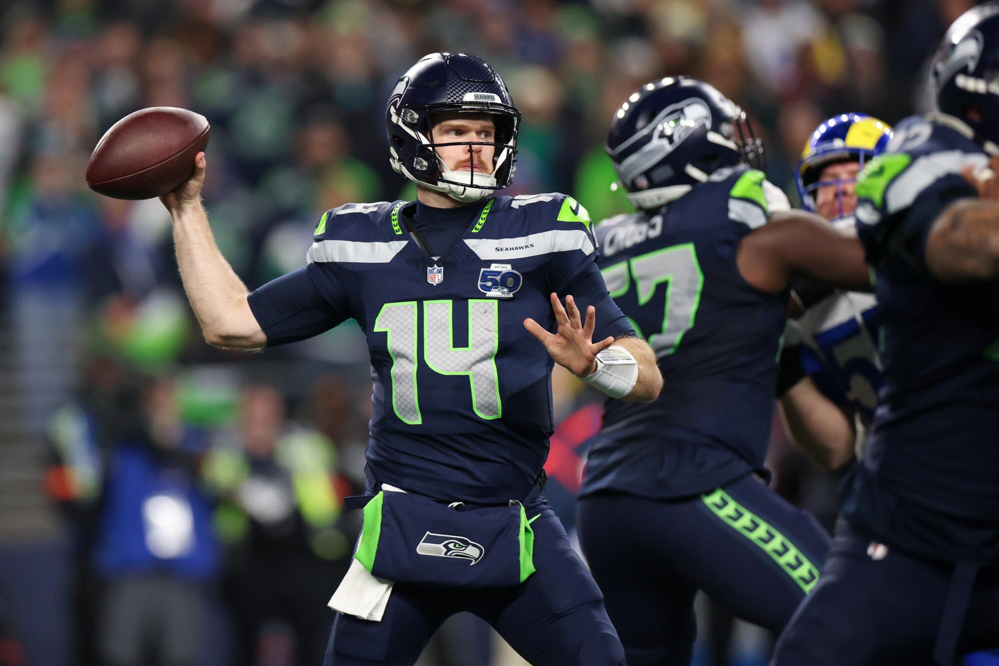Seattle Seahawks quarterback Sam Darnold passes against the Rams.