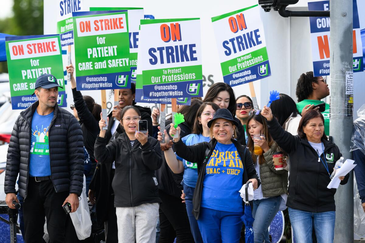 Kaiser Permanente workers strike outside of the company's medical center in Downey.