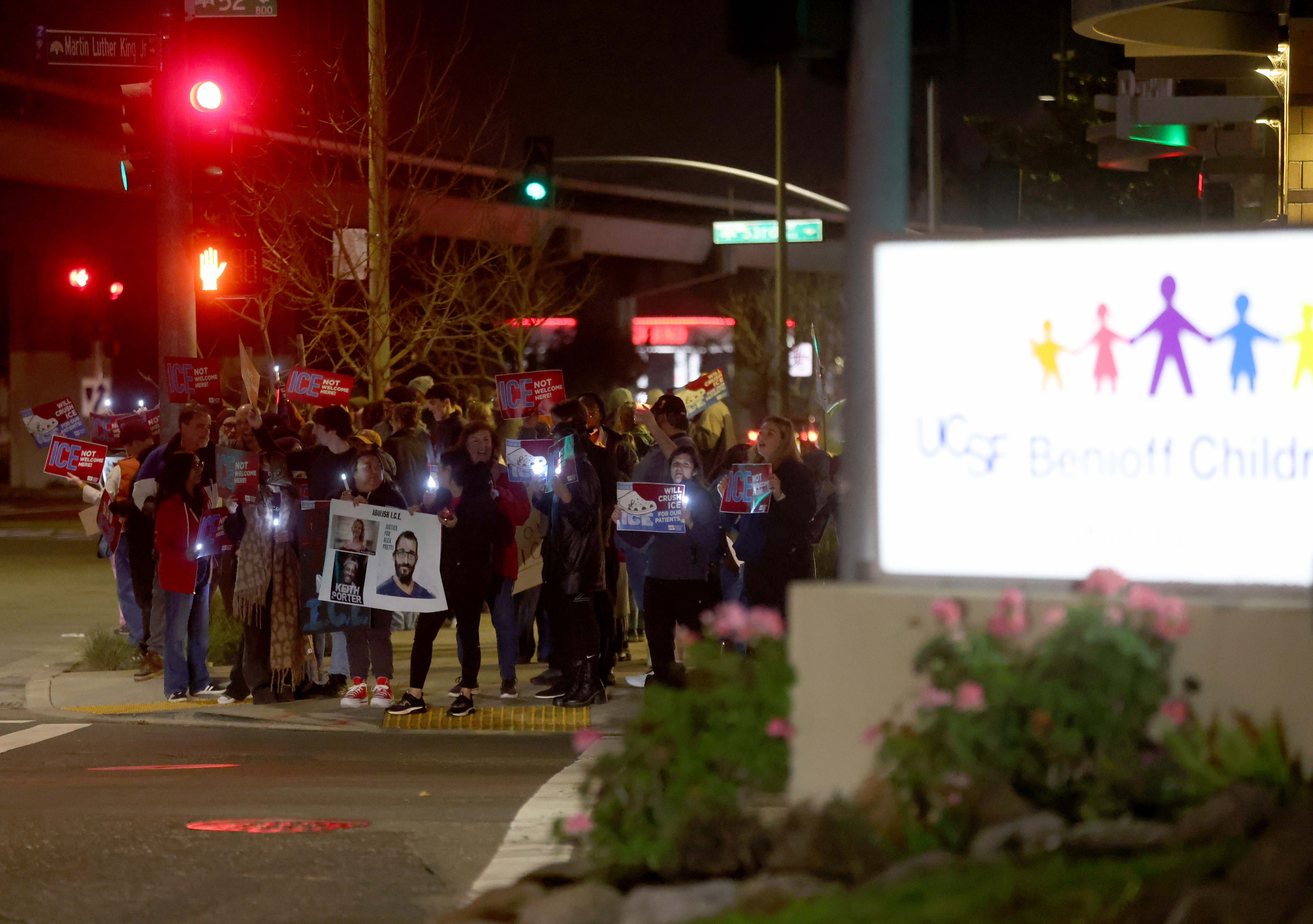 Healthcare workers and community members protest outside of UCSF Benioff...