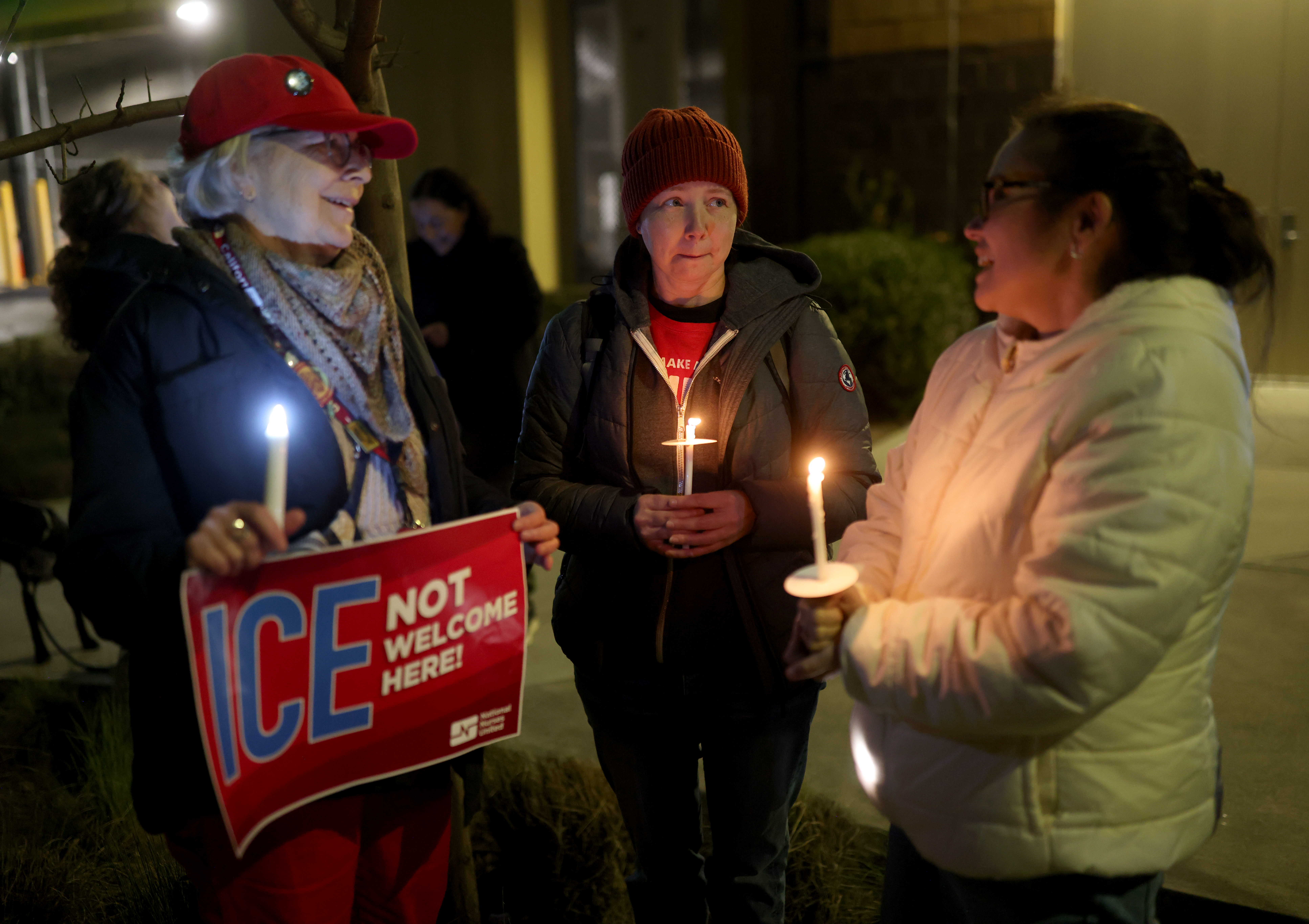 Healthcare workers Wendy Bloom, Holly Alley and Sherry Alcock, from...