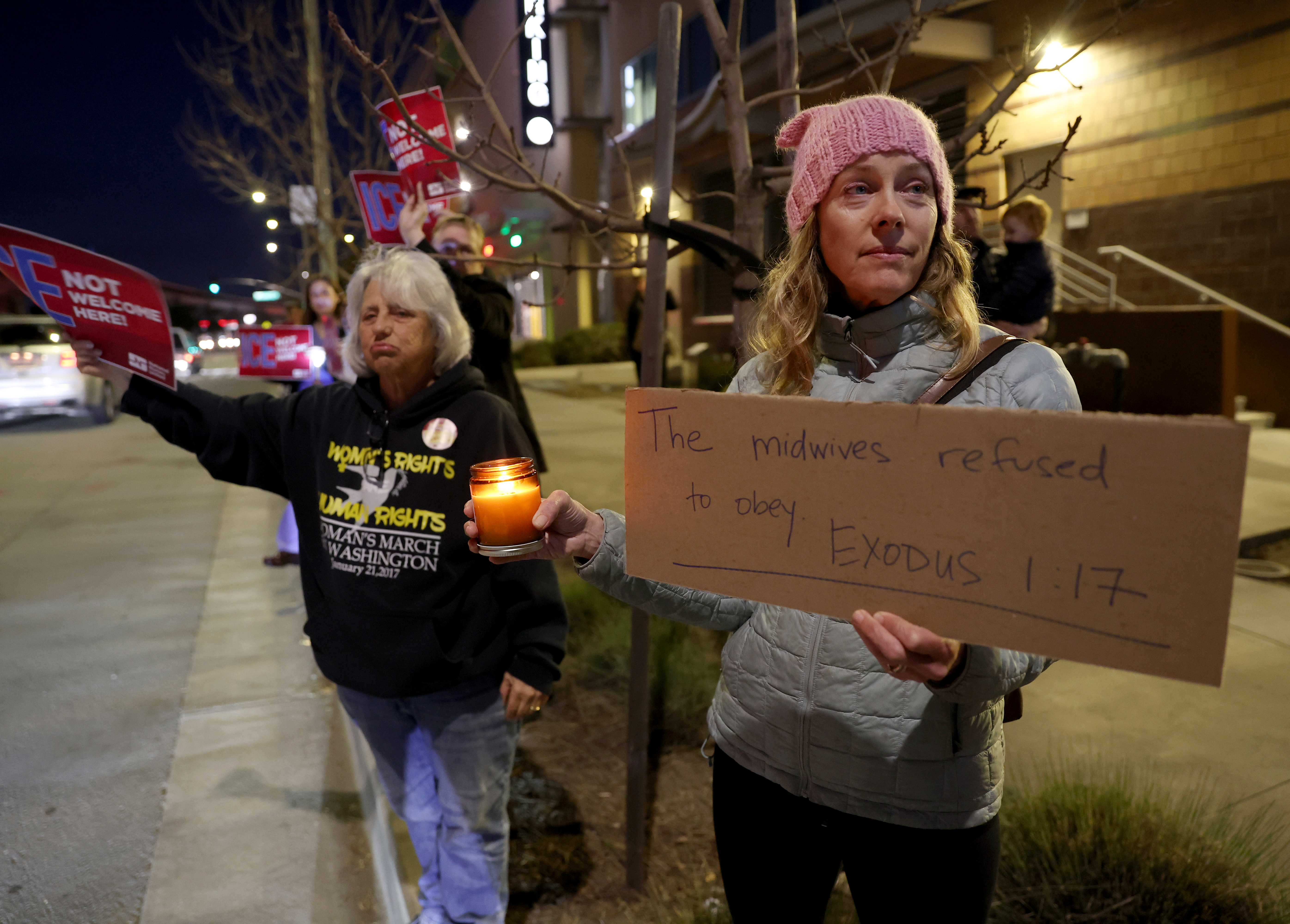 Nurse practitioner and midwife Kate McGlashan, right, and others protest...