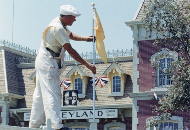 A craftsman works on the main entrance at Disneyland before the park opened in 1955. (Courtesy of Disney)