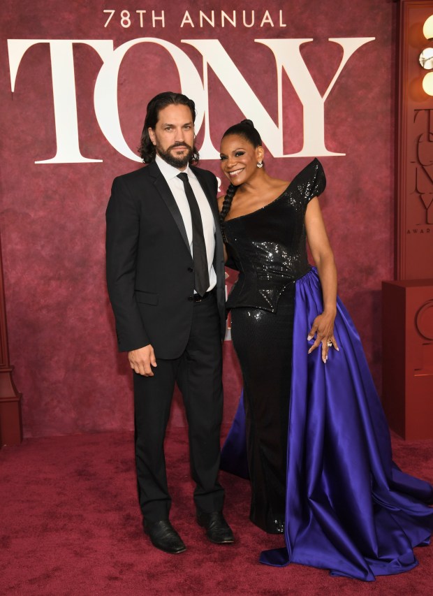 Will Swenson, left, and Audra McDonald arrive at the 78th Tony Awards on Sunday, June 8, 2025, at Radio City Music Hall in New York. (Photo by Evan Agostini/Invision/AP)