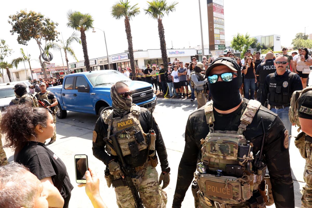 Residents confront ICE agents and Border Patrol agents as residents scream